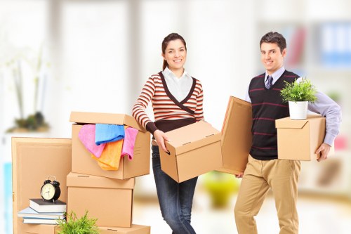 Neatly arranged boxes and furniture in a protected storage facility